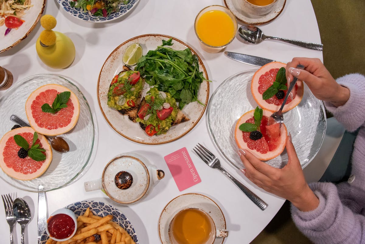 a table topped with plates of food on a plate